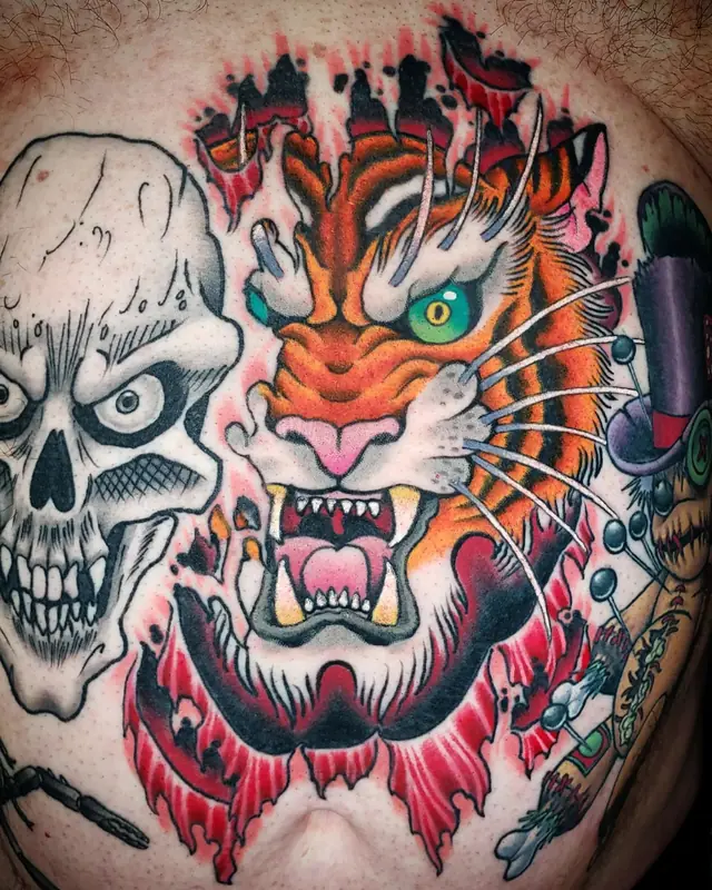 Traditional color tiger and skull by Chris Carp at Heart & Sword Tattoo