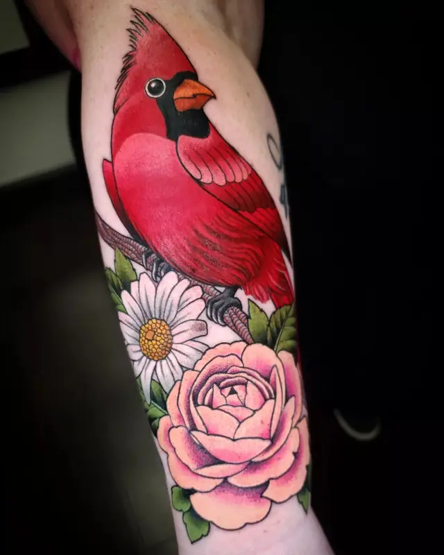 Cardinal with daisy and rose by Chris Carp at Heart & Sword Tattoo