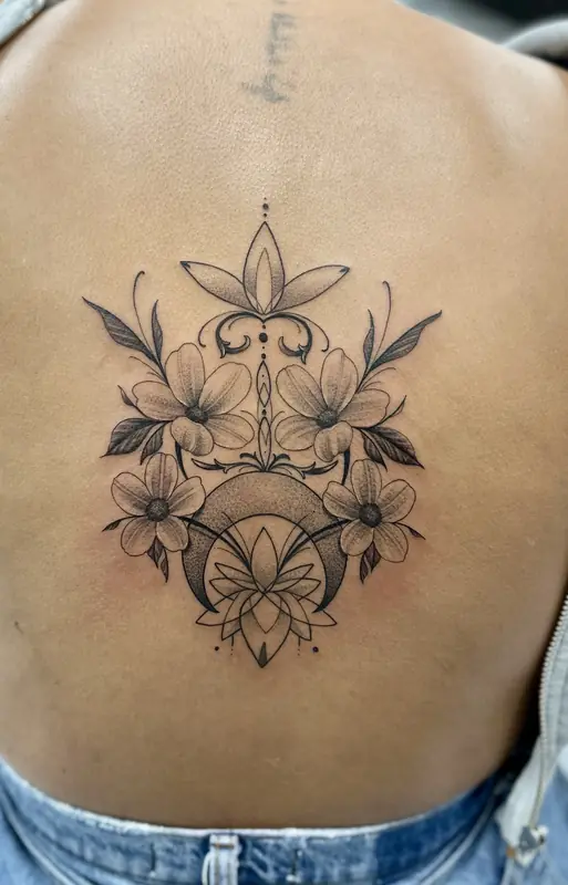 Fine line floral back piece by Johnny at Heart & Sword Tattoo